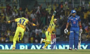 Chennai Super Kings players celebrate the fall of wicket of Mumbai Indians` Rohit Sharma at Chennai on April 6, 2013. (Photo: IANS)