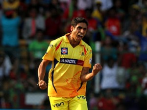Ashish Nehra of The Chennai Superkings celebrates the wicket of AB de Villiers of the Royal Challengers Bangalore during match 53 of the Pepsi Indian Premier League Season 2014 between the Royal Challengers Bangalore and the Chennai Superkings held at the M. Chinnaswamy Stadium, Bangalore, India on the 24th May  2014 Photo by Deepak Malik / IPL / SPORTZPICS Image use subject to terms and conditions which can be found here:  https://sportzpics.photoshelter.com/gallery/Pepsi-IPL-Image-terms-and-conditions/G00004VW1IVJ.gB0/C0000TScjhBM6ikg