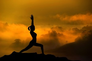 bigstock-Silhouette-of-woman-doing-yoga-52184770