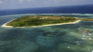 An aerial view shows the Pagasa (Hope) Island, part of the disputed Spratly group of islands, in the South China Sea located off the coast of western Philippines July 20, 2011. Five Philippine politicians are planning a trip to disputed territories in the South China Sea on Wednesday, asserting the country's claim on oil-and-gas-rich areas in a move expected to draw protests from other claimants. China, the Philippines, Malaysia, Brunei, Vietnam and Taiwan all claim territory in the South China Sea. REUTERS/Rolex Dela Pena/Pool (POLITICS) - RTR2P2YI